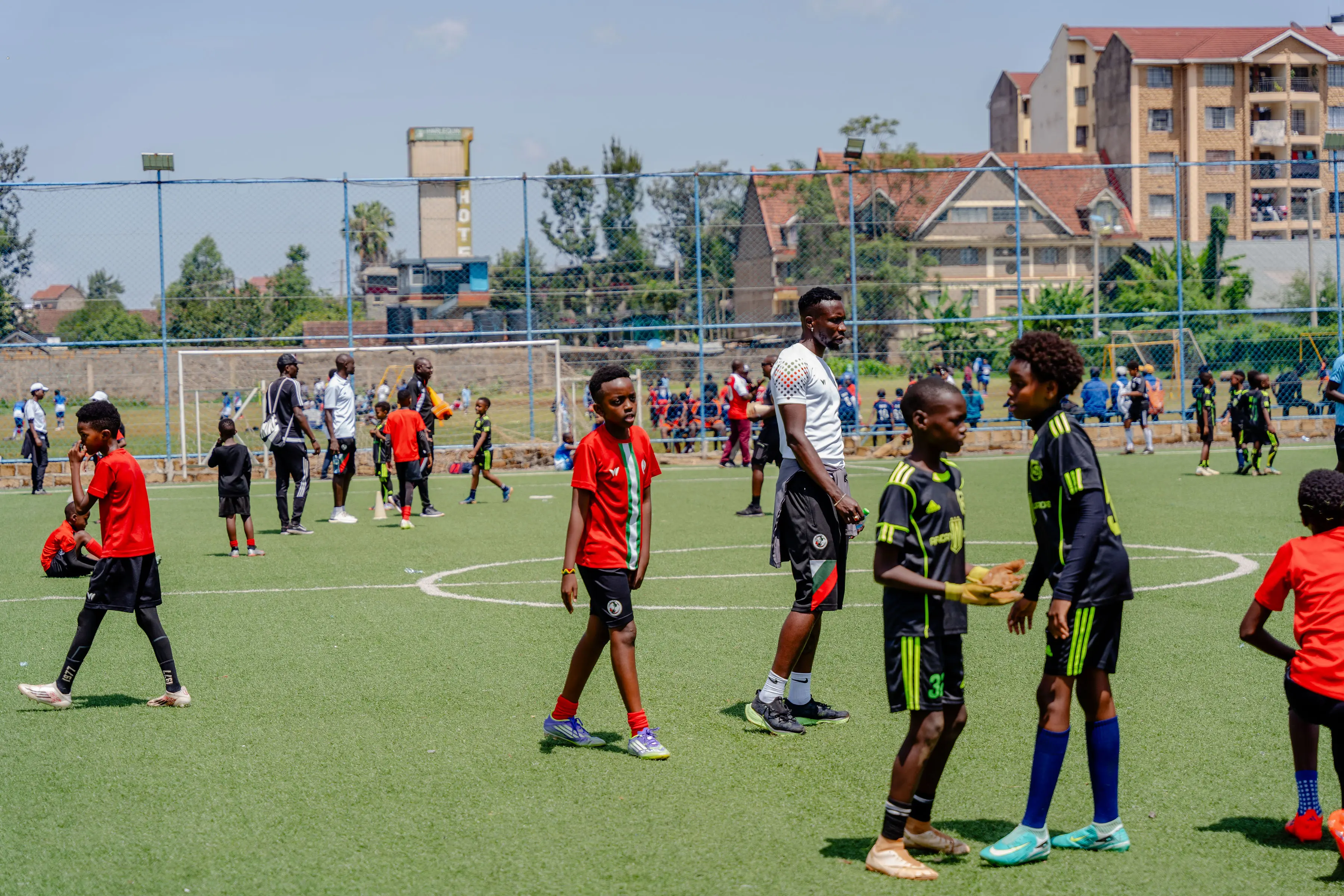 Young Kenyan footballer striking the ball at Kipawa Soccer Academy